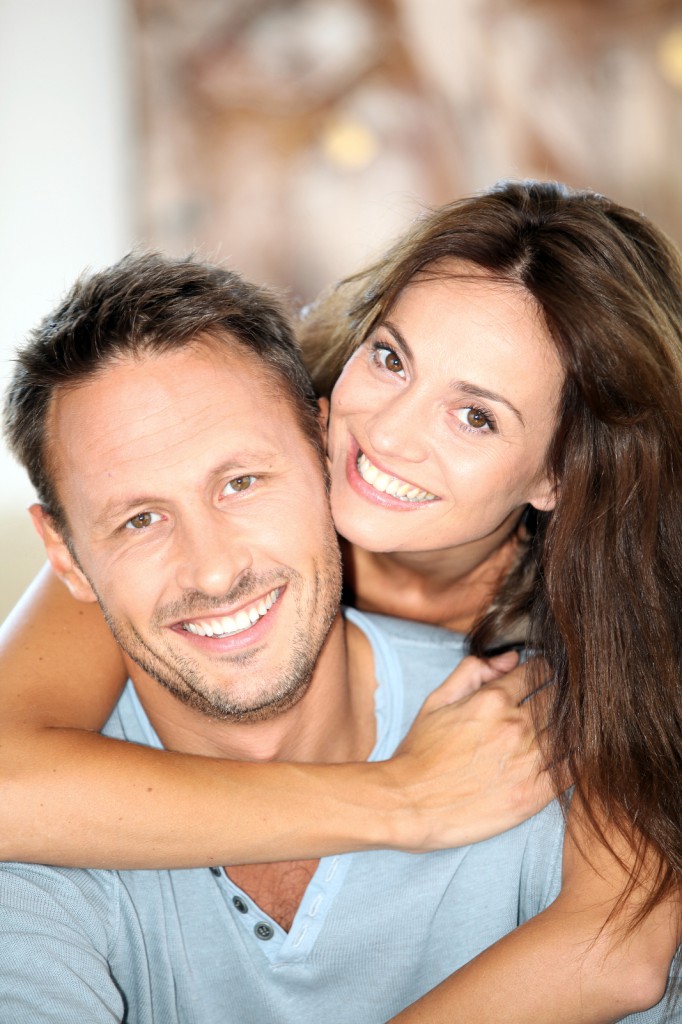 bigstock-Closeup-of-happy-couple-at-hom-16987226